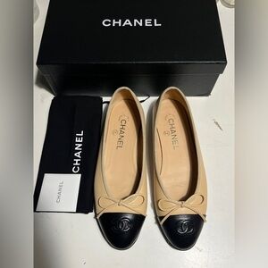 CHANEL Beige Leather Ballet Flats with Black Cap Toe and Bow